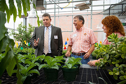 Dr. Bruce Dunn showcasing some of the new technology of the Greenhouse Learning Center to Rob Haddock and Dr. Cynda Clary, Associate Dean.